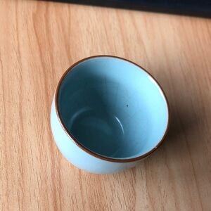 Light Blue Ceramic Cup with Brown Rim